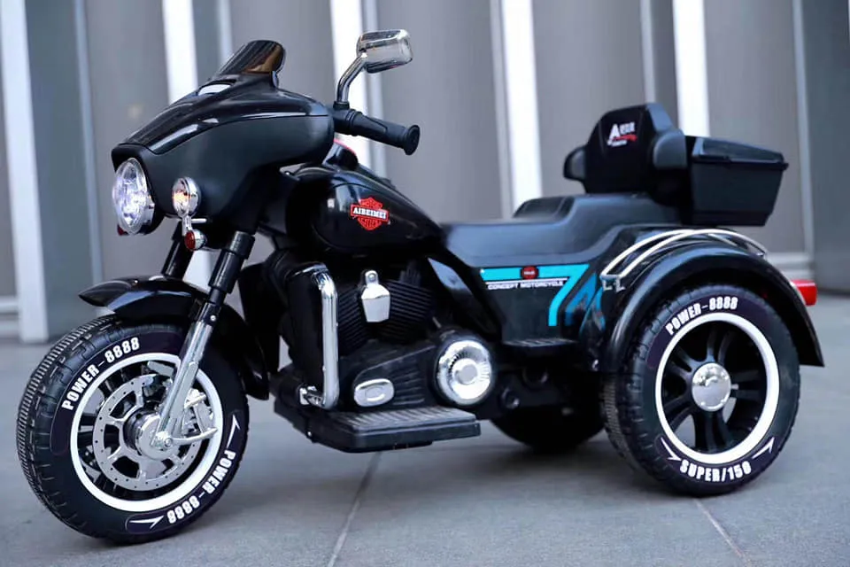High Quality Popular for Kids to Drive/Bigger Size Harley Motor. 12V4.5ah Battery. Double 380 Engine. LED Light. Music USB Motorcycle 3 Wheels Cem-22